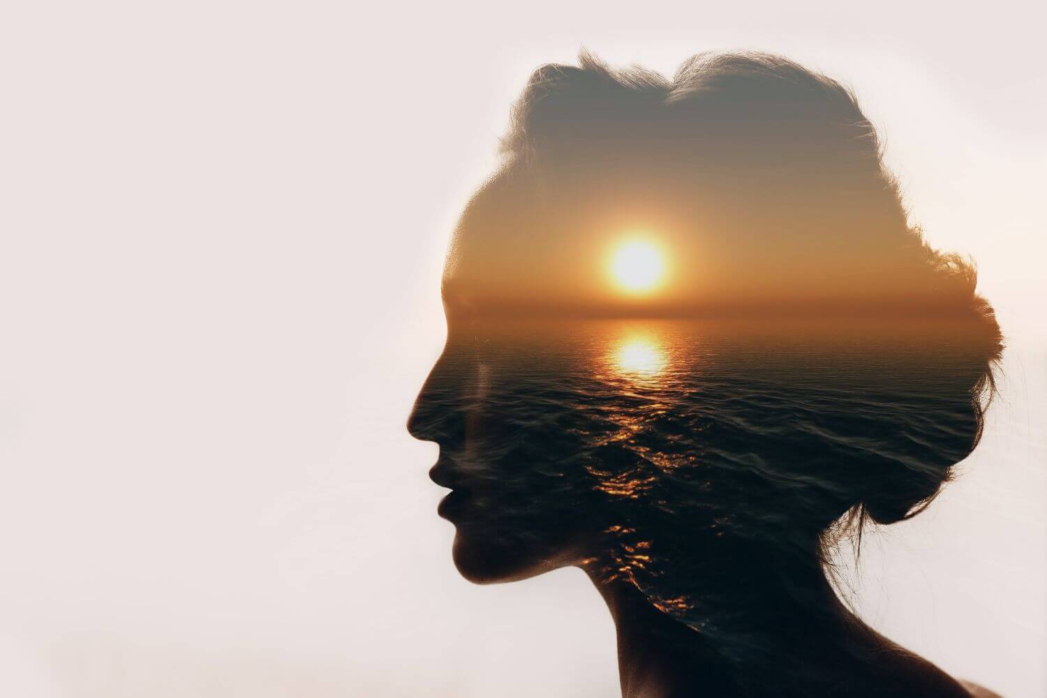 multiple-exposure-sunrise-and-sea-inside-woman-sil-2022-09-15-02-29-22-utc (1)