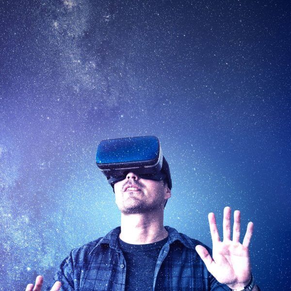 man-enjoying-a-vr-experience-2022-12-16-00-10-07-utc